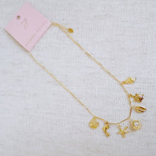 Golden Sea Charm Necklace – Shell, Dolphin & Starfish